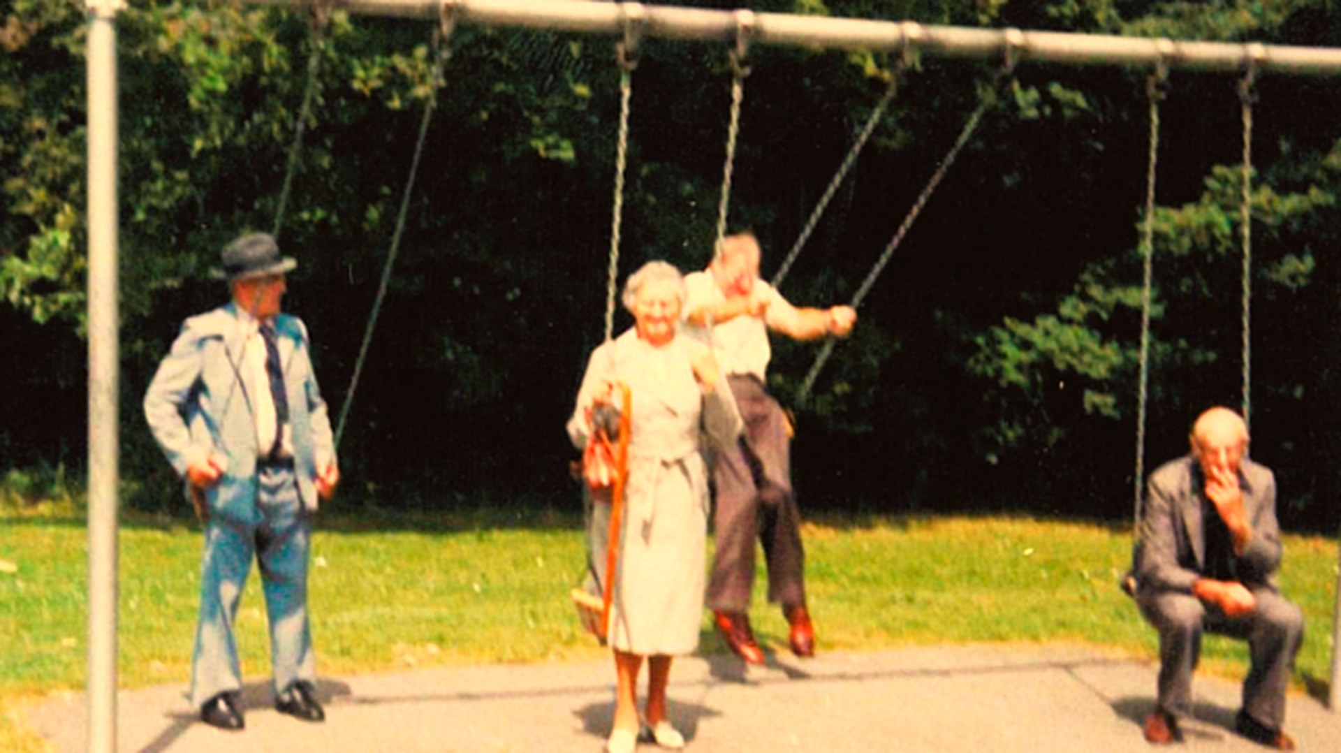 Seniors enjoying a swing set together